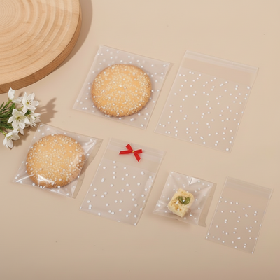 Tsellofaankotid liimiribaga Lumetäpid 100 x 100mm 10tk